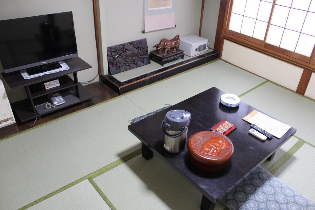 Kinokuniya Ryokan Fujisawa Quarto foto